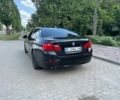 Чорний БМВ 5 Серія, об'ємом двигуна 2 л та пробігом 220 тис. км за 13399 $, фото 1 на Automoto.ua