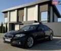 Черный БМВ 5 Серия, объемом двигателя 2 л и пробегом 287 тыс. км за 20999 $, фото 1 на Automoto.ua