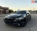 Черный БМВ 5 Серия, объемом двигателя 2 л и пробегом 102 тыс. км за 18700 $, фото 1 на Automoto.ua