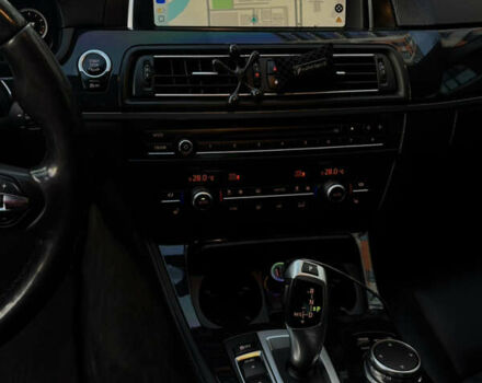 Черный БМВ 5 Серия, объемом двигателя 2 л и пробегом 209 тыс. км за 20000 $, фото 4 на Automoto.ua