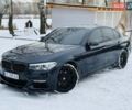 Черный БМВ 5 Серия, объемом двигателя 2 л и пробегом 160 тыс. км за 27500 $, фото 1 на Automoto.ua