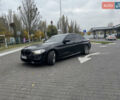 Черный БМВ 5 Серия, объемом двигателя 2 л и пробегом 220 тыс. км за 26800 $, фото 1 на Automoto.ua