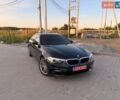 Чорний БМВ 5 Серія, об'ємом двигуна 2 л та пробігом 176 тис. км за 18000 $, фото 1 на Automoto.ua