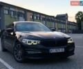 Чорний БМВ 5 Серія, об'ємом двигуна 2 л та пробігом 170 тис. км за 23590 $, фото 1 на Automoto.ua