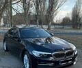 Черный БМВ 5 Серия, объемом двигателя 2 л и пробегом 117 тыс. км за 29500 $, фото 1 на Automoto.ua