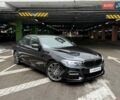 Чорний БМВ 5 Серія, об'ємом двигуна 2 л та пробігом 290 тис. км за 22990 $, фото 1 на Automoto.ua
