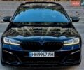Черный БМВ 5 Серия, объемом двигателя 4.39 л и пробегом 77 тыс. км за 37900 $, фото 1 на Automoto.ua