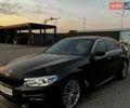 Чорний БМВ 5 Серія, об'ємом двигуна 2 л та пробігом 107 тис. км за 27500 $, фото 1 на Automoto.ua