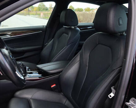 Черный БМВ 5 Серия, объемом двигателя 2 л и пробегом 180 тыс. км за 26000 $, фото 1 на Automoto.ua