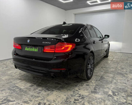 Черный БМВ 5 Серия, объемом двигателя 2 л и пробегом 160 тыс. км за 26500 $, фото 5 на Automoto.ua