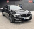 Черный БМВ 5 Серия, объемом двигателя 2 л и пробегом 77 тыс. км за 33700 $, фото 1 на Automoto.ua