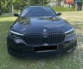 Черный БМВ 5 Серия, объемом двигателя 2 л и пробегом 96 тыс. км за 39999 $, фото 1 на Automoto.ua