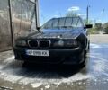 Черный БМВ 5 Серия, объемом двигателя 3 л и пробегом 382 тыс. км за 4484 $, фото 1 на Automoto.ua