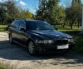 Черный БМВ 5 Серия, объемом двигателя 2.5 л и пробегом 400 тыс. км за 4950 $, фото 1 на Automoto.ua
