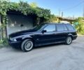 Черный БМВ 5 Серия, объемом двигателя 2.5 л и пробегом 301 тыс. км за 4000 $, фото 1 на Automoto.ua