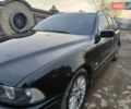 Черный БМВ 5 Серия, объемом двигателя 2.5 л и пробегом 310 тыс. км за 4450 $, фото 1 на Automoto.ua