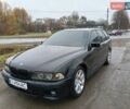 Черный БМВ 5 Серия, объемом двигателя 2.5 л и пробегом 400 тыс. км за 4400 $, фото 1 на Automoto.ua