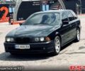 Черный БМВ 5 Серия, объемом двигателя 3 л и пробегом 300 тыс. км за 3950 $, фото 1 на Automoto.ua