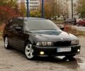Черный БМВ 5 Серия, объемом двигателя 3 л и пробегом 406 тыс. км за 5700 $, фото 1 на Automoto.ua