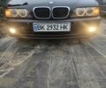 Черный БМВ 5 Серия, объемом двигателя 2.5 л и пробегом 435 тыс. км за 4700 $, фото 1 на Automoto.ua