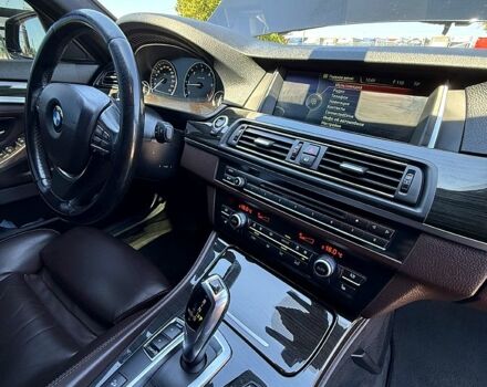 Черный БМВ 5 Серия, объемом двигателя 2 л и пробегом 313 тыс. км за 17700 $, фото 5 на Automoto.ua