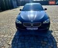 Черный БМВ 5 Серия, объемом двигателя 2 л и пробегом 275 тыс. км за 14400 $, фото 1 на Automoto.ua