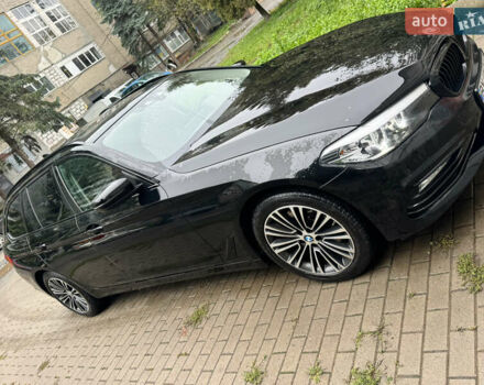 Чорний БМВ 5 Серія, об'ємом двигуна 2 л та пробігом 294 тис. км за 23999 $, фото 1 на Automoto.ua