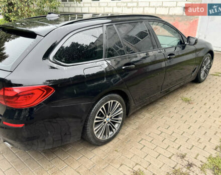 Чорний БМВ 5 Серія, об'ємом двигуна 2 л та пробігом 294 тис. км за 23999 $, фото 2 на Automoto.ua