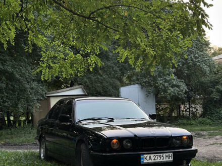 Черный БМВ 5 Серия, объемом двигателя 1.99 л и пробегом 415 тыс. км за 4000 $, фото 1 на Automoto.ua