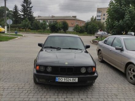 Черный БМВ 5 Серия, объемом двигателя 2.5 л и пробегом 430 тыс. км за 2800 $, фото 1 на Automoto.ua