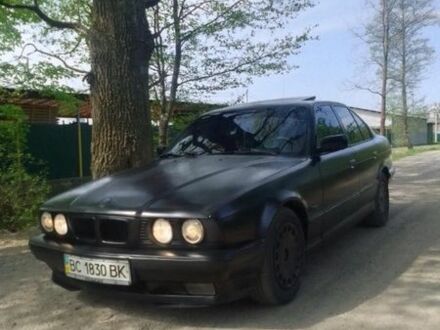 Черный БМВ 5 Серия, объемом двигателя 2.5 л и пробегом 220 тыс. км за 1890 $, фото 1 на Automoto.ua