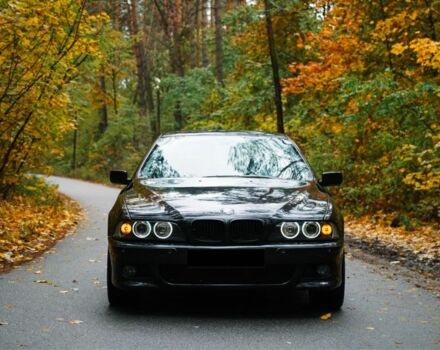 Черный БМВ 5 Серия, объемом двигателя 4.4 л и пробегом 400 тыс. км за 13000 $, фото 1 на Automoto.ua