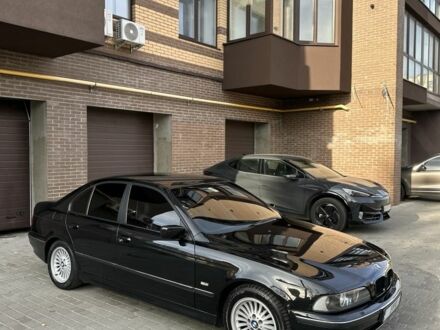 Черный БМВ 5 Серия, объемом двигателя 2.5 л и пробегом 300 тыс. км за 4999 $, фото 1 на Automoto.ua