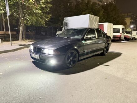 Черный БМВ 5 Серия, объемом двигателя 2.8 л и пробегом 345 тыс. км за 3850 $, фото 1 на Automoto.ua