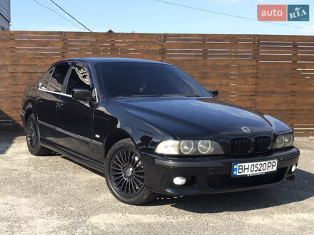 Черный БМВ 5 Серия, объемом двигателя 1.99 л и пробегом 299 тыс. км за 4399 $, фото 1 на Automoto.ua