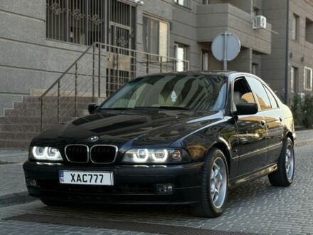 Черный БМВ 5 Серия, объемом двигателя 2.5 л и пробегом 500 тыс. км за 5000 $, фото 1 на Automoto.ua