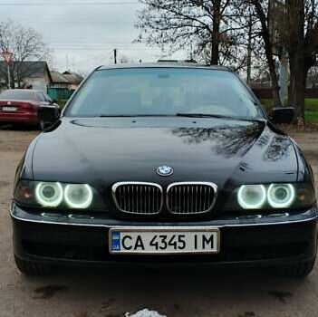 Черный БМВ 5 Серия, объемом двигателя 2.5 л и пробегом 500 тыс. км за 4000 $, фото 1 на Automoto.ua