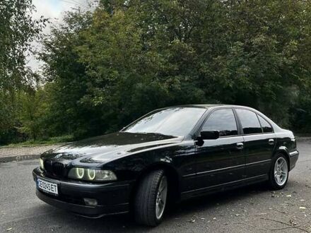 Черный БМВ 5 Серия, объемом двигателя 2.5 л и пробегом 271 тыс. км за 5800 $, фото 1 на Automoto.ua