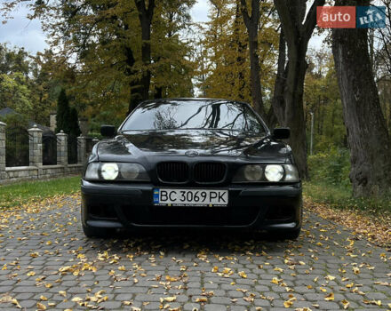 Черный БМВ 5 Серия, объемом двигателя 2.5 л и пробегом 299 тыс. км за 2999 $, фото 1 на Automoto.ua