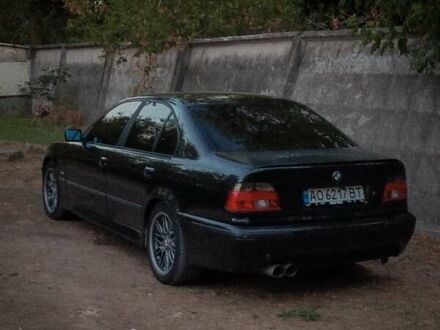 Черный БМВ 5 Серия, объемом двигателя 4.4 л и пробегом 470 тыс. км за 5800 $, фото 1 на Automoto.ua