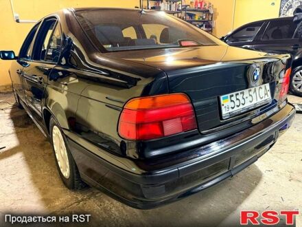 Черный БМВ 5 Серия, объемом двигателя 2 л и пробегом 249 тыс. км за 4480 $, фото 1 на Automoto.ua