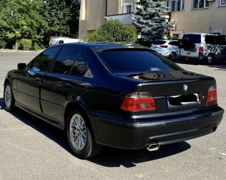 Черный БМВ 5 Серия, объемом двигателя 2.5 л и пробегом 298 тыс. км за 5500 $, фото 1 на Automoto.ua