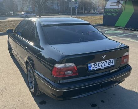 Черный БМВ 5 Серия, объемом двигателя 2.5 л и пробегом 401 тыс. км за 6550 $, фото 1 на Automoto.ua