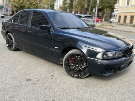 Черный БМВ 5 Серия, объемом двигателя 3.5 л и пробегом 300 тыс. км за 5199 $, фото 1 на Automoto.ua