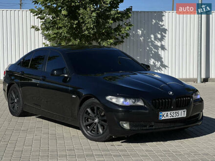 Черный БМВ 5 Серия, объемом двигателя 2 л и пробегом 322 тыс. км за 14799 $, фото 1 на Automoto.ua