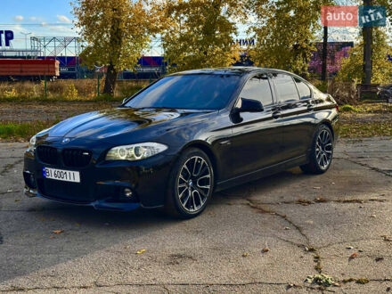 Черный БМВ 5 Серия, объемом двигателя 2 л и пробегом 207 тыс. км за 14200 $, фото 1 на Automoto.ua