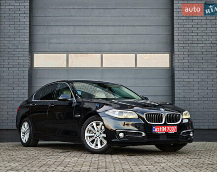 Черный БМВ 5 Серия, объемом двигателя 2 л и пробегом 231 тыс. км за 18499 $, фото 1 на Automoto.ua