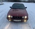 Красный БМВ 5 Серия, объемом двигателя 2.4 л и пробегом 200 тыс. км за 1700 $, фото 1 на Automoto.ua