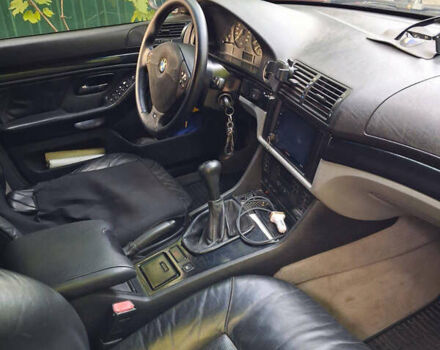 Красный БМВ 5 Серия, объемом двигателя 2.5 л и пробегом 340 тыс. км за 6500 $, фото 10 на Automoto.ua