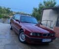 Красный БМВ 5 Серия, объемом двигателя 2.5 л и пробегом 430 тыс. км за 4999 $, фото 1 на Automoto.ua